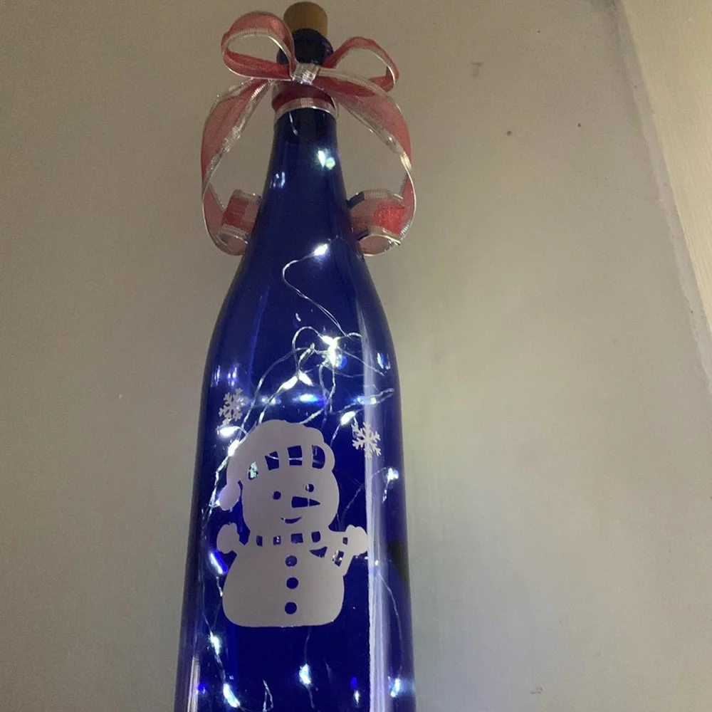 Snowman blue wine bottle lantern